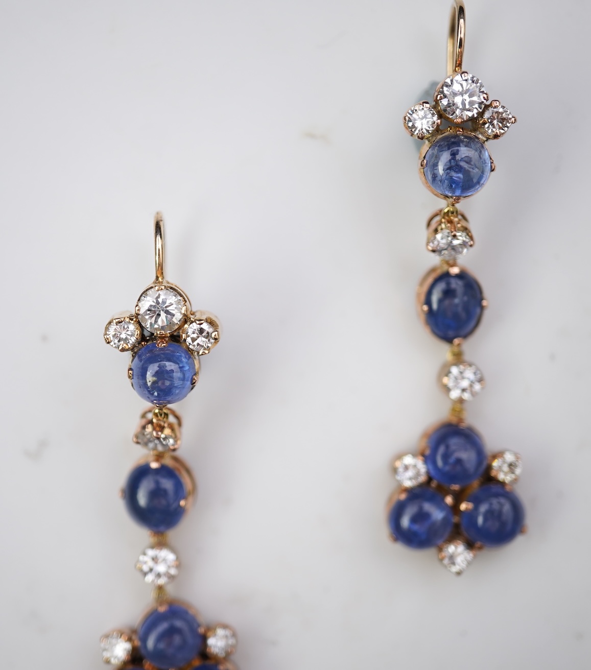 A pair of sapphire and diamond drop earrings